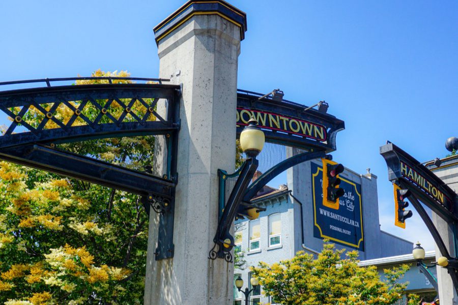 Concrete and metal arches with "Downtown Hamilton" written across them