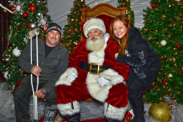 2018 Victorian Night. People posing for a picture with Santa.