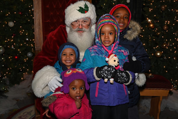 2019 Victorian Night. Group of children posing with Santa Claus.