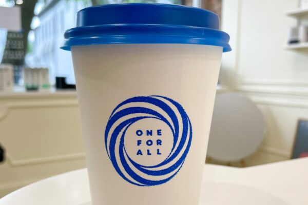 Coffe cup on counter at One For All