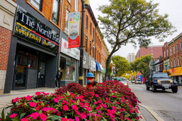Image of King St. East looking Northeast from Walnut St. with flowers in the foreground